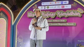 Analis Yunior/Asisten Manajer Fungsi Pelaksana Pengembangan UMKM KPw BI Sulut, Heriyanto, saat memberikan sambutan mewakili Kepala BI Sulut Joko Supratikto terkait penguatan ekonomi syariah pada penutupan Wisata Kuliner Ramadhan 2026 di Megamas Manado. Foto Istimewa