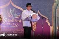 Kepala Dinas Perkebunan Sulawesi Utara, Darwin Muskin, saat membacakan sambutan Gubernur Yulius Selvanus pada puncak acara Hijrah Sulut Fest 2026 di Atrium Megamall Manado, Sabtu (28/2/2026).Foto : Jurnalis BI