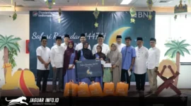 Jajaran manajemen BNI Wilayah 11 Suluttenggomalut berfoto bersama anak-anak dari Panti Asuhan Al-Ikhwan usai kegiatan Safari Ramadan di Kantor BNI Wilayah 11, Manado, Senin (9/3/2026). Foto : BNI Manado