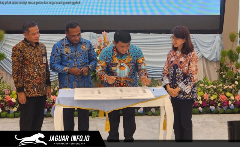 Kementerian ATR/BPN, KPK, dan Pemda Sulut saat menandatangani komitmen bersama transformasi pelayanan pertanahan di Wisma Negara Sulut.