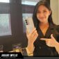 Detail spesifikasi Realme C100 yang menampilkan desain bodi belakang dengan efek visual Blooming Design yang dinamis.