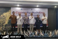 Kepala Perwakilan Bank Indonesia Sulut Joko Supratikto bersama Kepala DPMPTSP Sulut Hermina Syaloom Korompis saat menghadiri kegiatan Capacity Building di Sentra Hotel Minahasa Utara, 17/06/26.