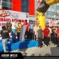 Kapolresta Manado Kombes Pol Irham Halid bersama unsur Forkopimda dan masyarakat mengikuti jalan sehat dalam rangka Hari Bhayangkara ke-80 di Lapangan Marina Plaza, 20/06/26.