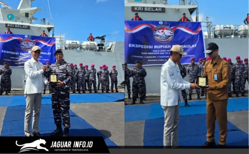 Kepala Perwakilan Bank Indonesia Sulawesi Utara, Joko Supratikto, menyerahkan cendera mata kepada perwakilan TNI Angkatan Laut sebagai simbol kolaborasi dalam misi Ekspedisi Rupiah Berdaulat 2026 di Dermaga Samuel Languju, Bitung, 23/06/26.