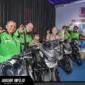 Seremoni penyerahan hadiah Program Berkah Ojek Online MyPertamina (BOOM) periode pertama kepada mitra pengemudi di SPBU COCO MT Haryono, Jakarta, 25/06/26.