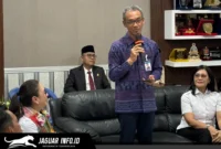Kepala Perwakilan Bank Indonesia Provinsi Sulawesi Utara, Joko Supratikto, memberikan sambutan dalam acara penandatanganan Kerja Sama Antardaerah antara Pemkab Minahasa dan Pemkab Sidrap terkait pemenuhan komoditas beras di Minahasa, 02/07/26.