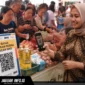 Gambar Ilustrasi, warga mencoba sistem digitalisasi pembayaran melalui pindai barcode saat mengikuti Gerakan Pangan Murah di Malalayang Beach Walk, Manado.