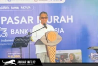 Joko Supratikto, Kepala Perwakilan Bank Indonesia Provinsi Sulawesi Utara, menyampaikan sambutan dalam acara Sinergi Pasar Murah di Manado, 23/07/26. Kegiatan ini merupakan kolaborasi untuk menjaga stabilitas harga pangan.