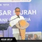 Joko Supratikto, Kepala Perwakilan Bank Indonesia Provinsi Sulawesi Utara, menyampaikan sambutan dalam acara Sinergi Pasar Murah di Manado, 23/07/26. Kegiatan ini merupakan kolaborasi untuk menjaga stabilitas harga pangan.