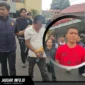 Petugas kepolisian dari Tim URC Ditreskrimum Polda Sulawesi Utara saat menggiring terduga pelaku penggelapan mobil perusahaan berinisial U menuju ruang penyidik di Mapolda Sulut untuk menjalani pemeriksaan lebih lanjut. (Foto: Dok. Jaguarinfo.id)