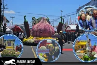 Kendaraan hias milik Bank Indonesia Provinsi Sulawesi Utara berbalut bunga asli saat melintas di panggung utama parade TOF pada ajang TIFF 2026 di Kota Tomohon.