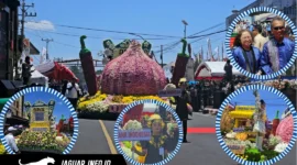 Kendaraan hias milik Bank Indonesia Provinsi Sulawesi Utara berbalut bunga asli saat melintas di panggung utama parade TOF pada ajang TIFF 2026 di Kota Tomohon.