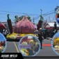 Kendaraan hias milik Bank Indonesia Provinsi Sulawesi Utara berbalut bunga asli saat melintas di panggung utama parade TOF pada ajang TIFF 2026 di Kota Tomohon.