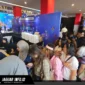 Antusiasme warga yang rela mengantre panjang untuk melakukan registrasi dan memindai QRIS senilai 81 rupiah demi mendapatkan suvenir menarik di ajang Urban Digifest X Sulut Coffee Fest 2026.
