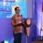 Kepala KPw BI Sulawesi Utara, Joko Supratikto, menyampaikan sambutan sekaligus pemaparan terkait pertumbuhan ekonomi daerah dalam acara Bincang Ekonomi di Ballroom Hotel Fourpoints Manado, 16/08/26.