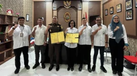 Penandatanganan Perjanjian Kerja Sama antara BPJS Ketenagakerjaan Manado Konsol dan pihak Kejaksaan.