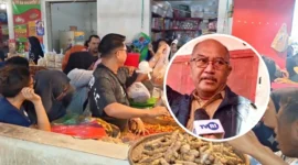 Asisten II Setda Kota Manado, Atto R. M. Bulo saat diwawancarai usai meninjau langsung kegiatan distribusi pangan di Pasar Bersehati, Manado.