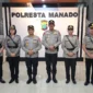 Kapolresta Manado Kombes Pol Irham Halid bersama Wakapolresta serta para pejabat yang diserahterimakan berfoto bersama usai upacara sertijab.