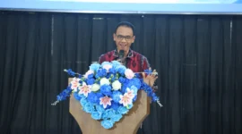 Kepala Perwakilan Bank Indonesia (KPw BI) Provinsi Sulawesi Utara, Joko Supratikto, saat memberikan sambutan penting mengenai peran strategis TP PKK dalam pengendalian inflasi pangan pada acara lomba cipta menu yang digelar di Graha Gubernuran Sulawesi Utara, Selasa (22/9/2026).