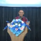 Kepala Perwakilan Bank Indonesia (KPw BI) Provinsi Sulawesi Utara, Joko Supratikto, saat memberikan sambutan penting mengenai peran strategis TP PKK dalam pengendalian inflasi pangan pada acara lomba cipta menu yang digelar di Graha Gubernuran Sulawesi Utara, Selasa (22/9/2026).