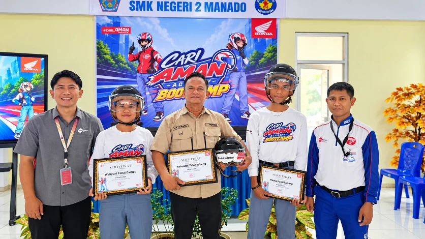 Dua siswa SMK Negeri 2 Manado, Wahyudi Fahri Didipu dan Hizkia Kundimang, mewakili PT DAW di Cari Aman Academy tingkat nasional.