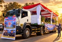 Mobil kontainer Ditpolairud Polda Sulut yang dihiasi ucapan selamat HUT ke-81 TNI dalam rangka kejutan untuk jajaran TNI di Lanudal Manado, Senin (5/10/2026).