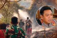Kapolres Tomohon AKBP Novrial Alberti Kombo ikut membantu pemadaman kebakaran hutan dan lahan di kawasan Gunung Lokon, Selasa (13/10/2026).