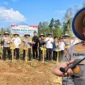 Kapolda Sulut Yudo Hermanto bersama Forkopimda menghadiri panen raya jagung varietas Yellow Corn di Minahasa Utara.